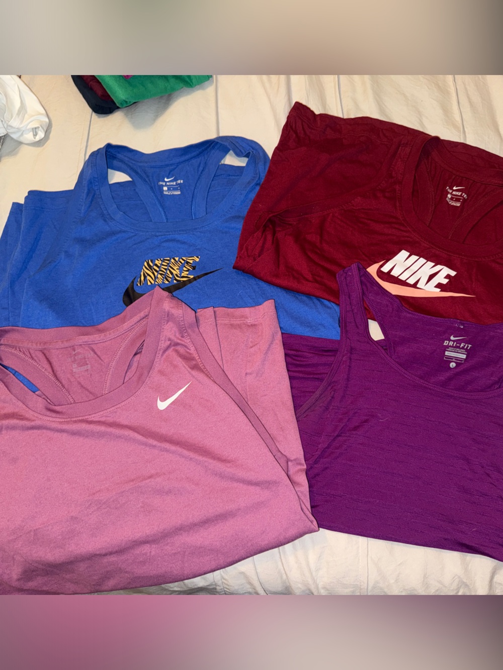 Set of 4 Nike racerback tanks- size Large